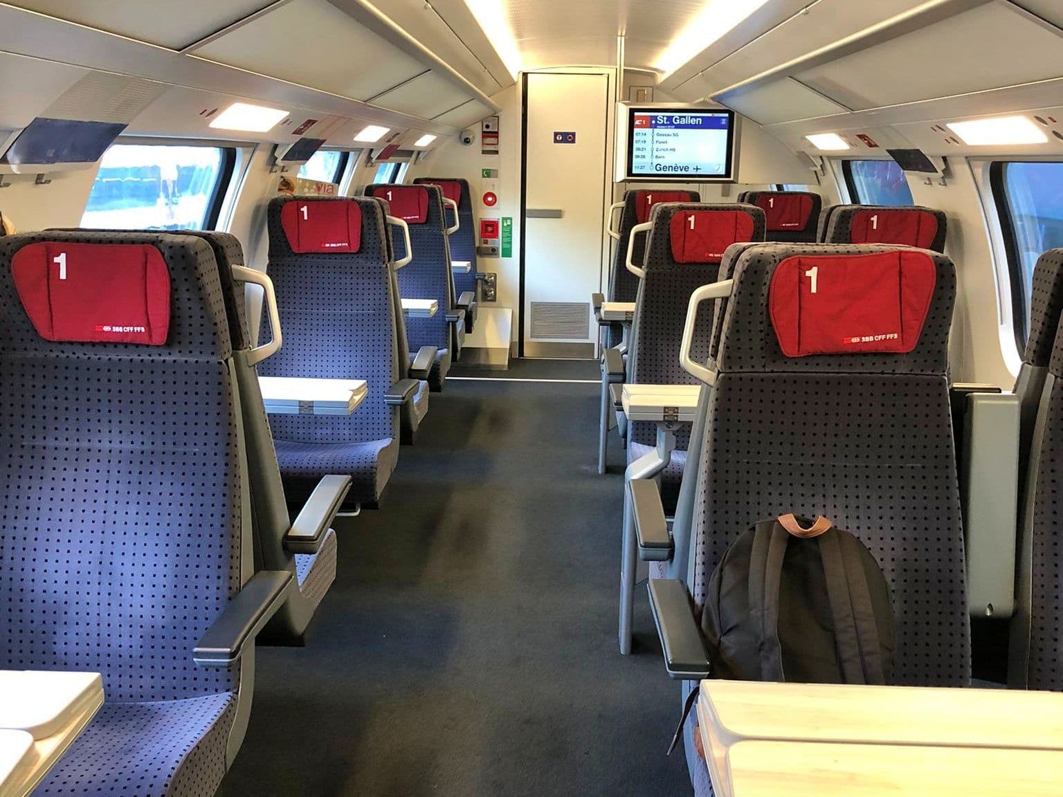 Train: Comfortable and modern seating area with plenty of space for travelers.