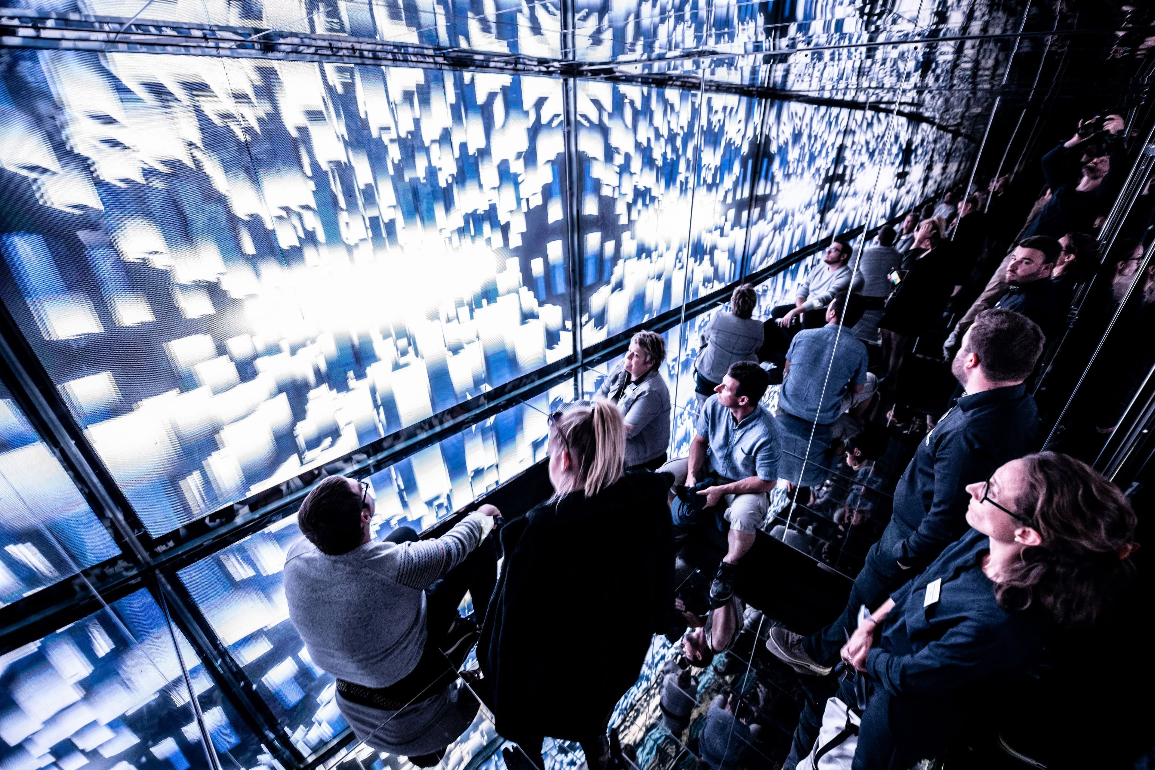 Murten Circuit Secret, people experience the immersive installation, modern art, light, and interactivity