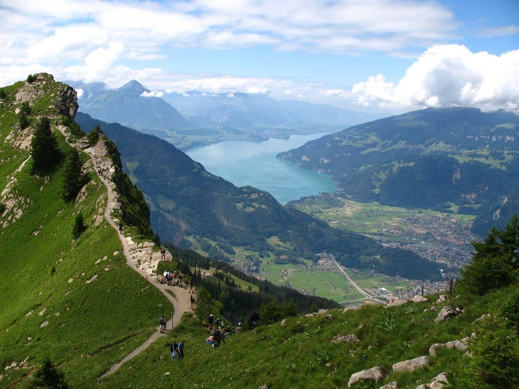 Bus tour to Interlaken: impressive landscape with mountains and nature by the lake.