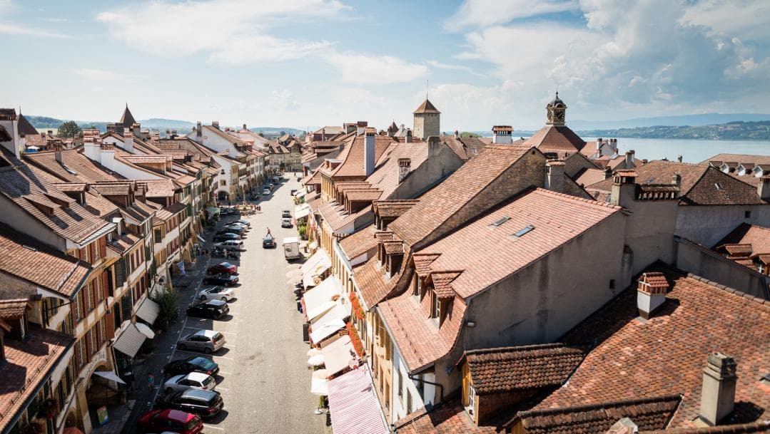 Guided tour of Murten with views of the old town and rooftops of the city.