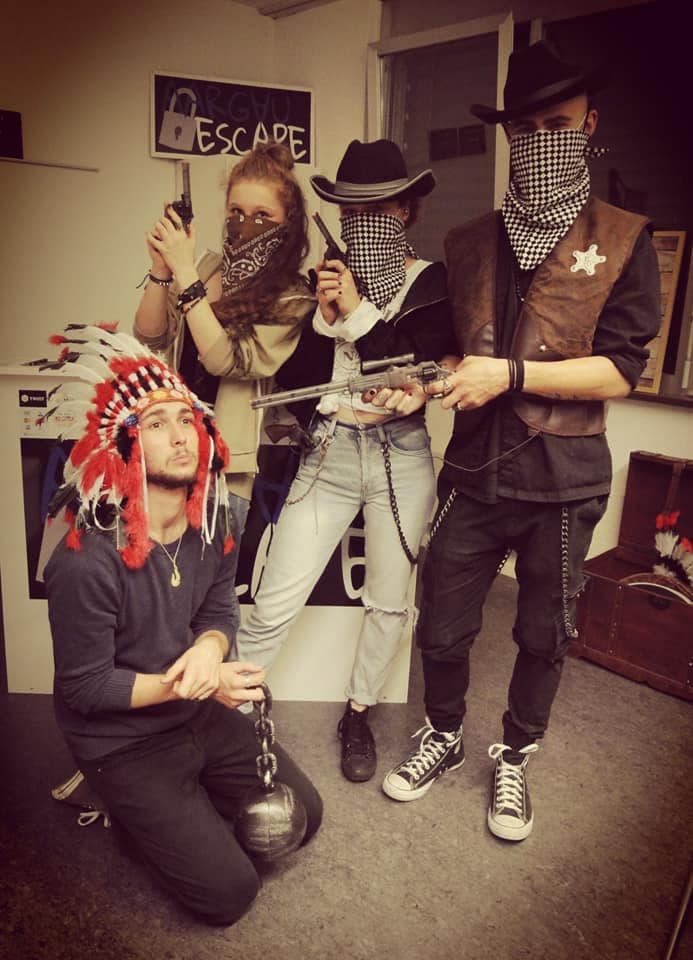 High Noon Aargau Escape Room with participants in costumes and props.