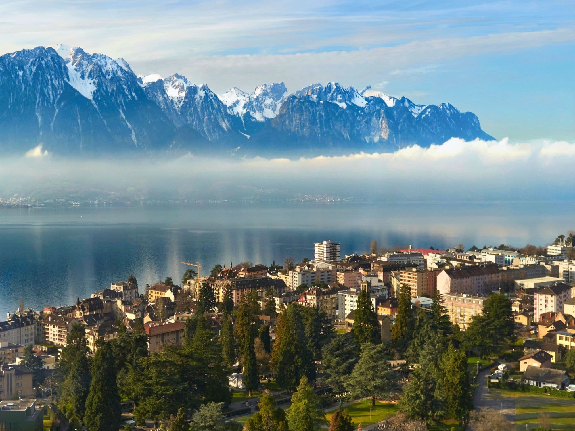 Geneva Montreux private transfer with a view of mountains and lake