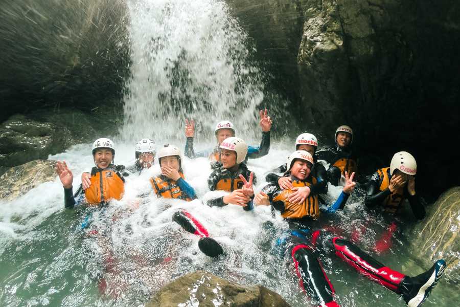 Saxetenschlucht Beginner Canyoning with Participants in the Waterfall