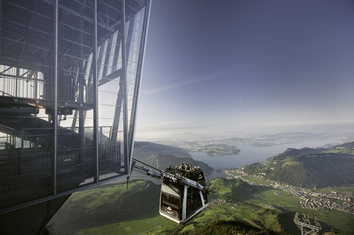 Stanserhorn Cable Car with a view of Lake Lucerne and the mountain landscape in 2023.